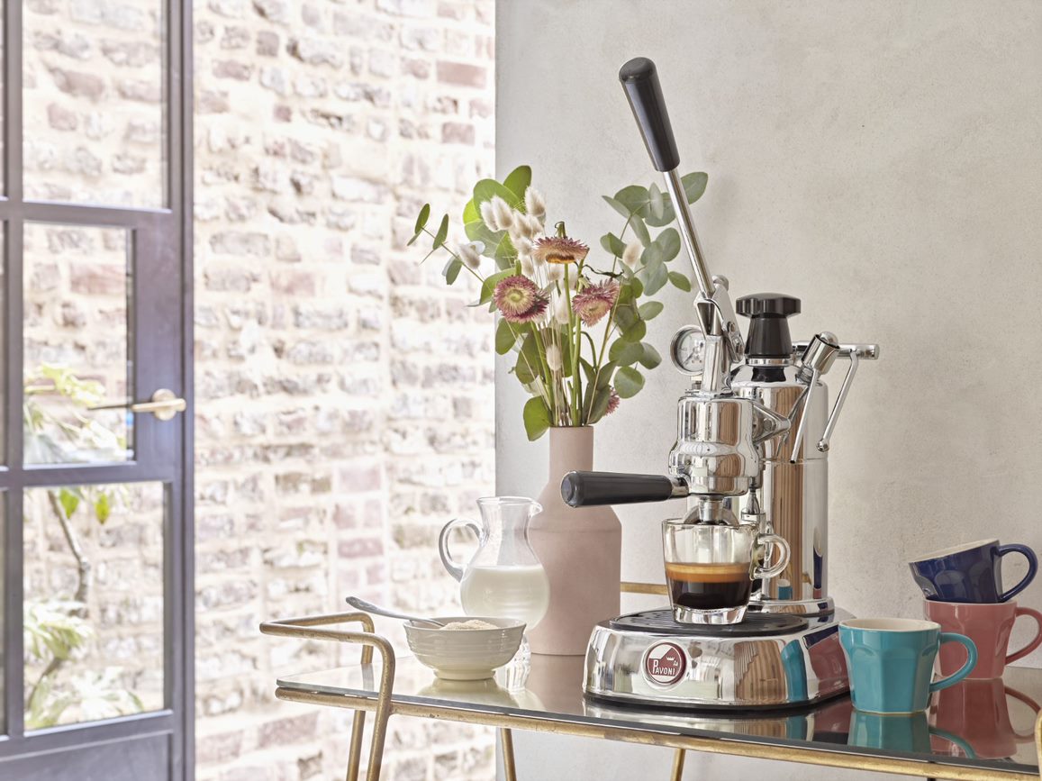 La Pavoni Lever Coffee Machine on table in living space making espresso