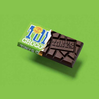 Tony's Chocolonely almond chocolate coming out of green packet