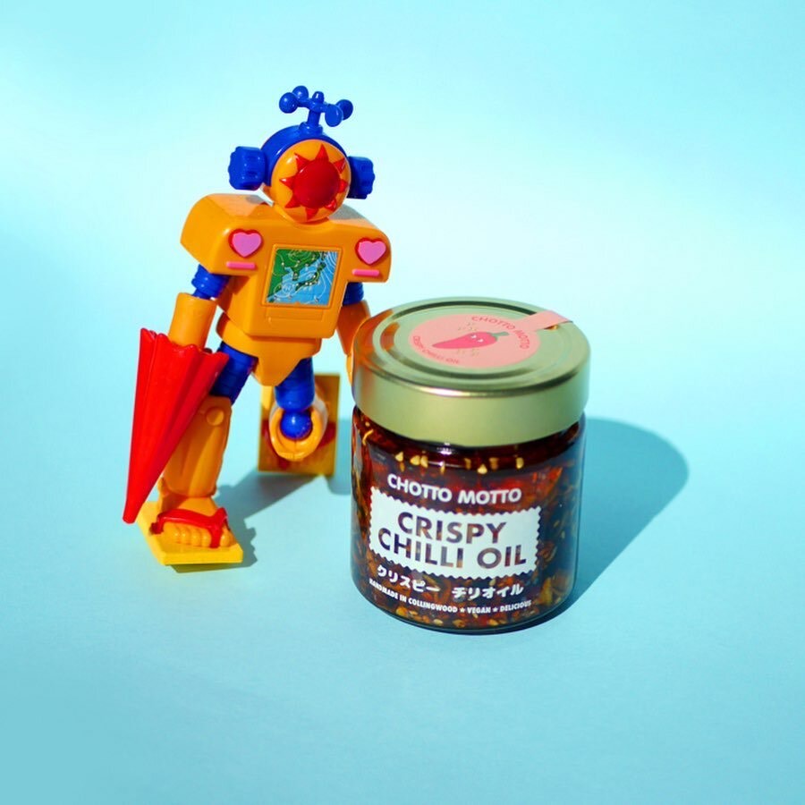 Chotto Motto crispy chilli oil in jar with a colourful robot toy